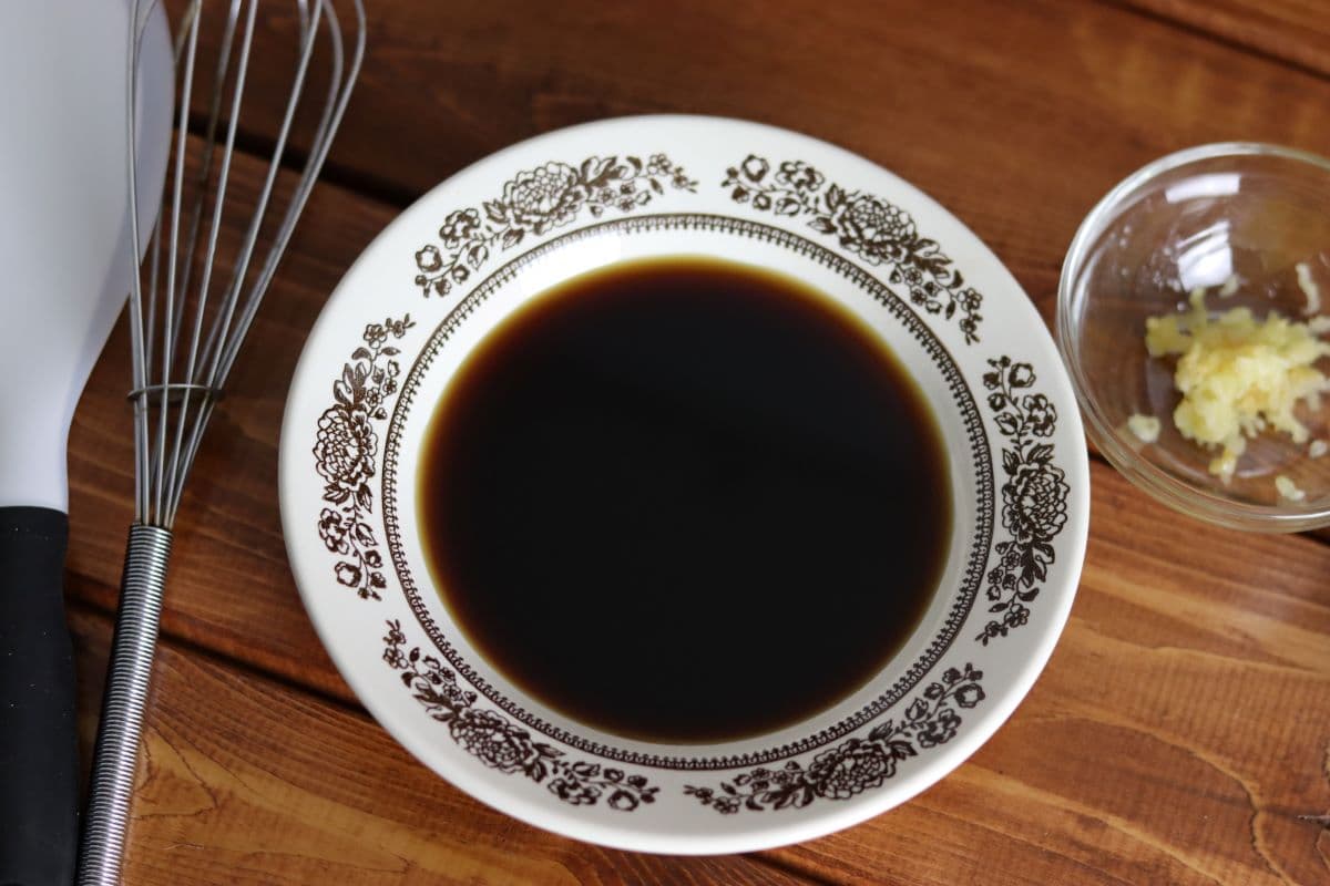 brown sauce in a bowl on a table.