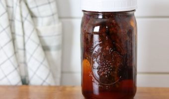 sumacade brewing in a quart jar