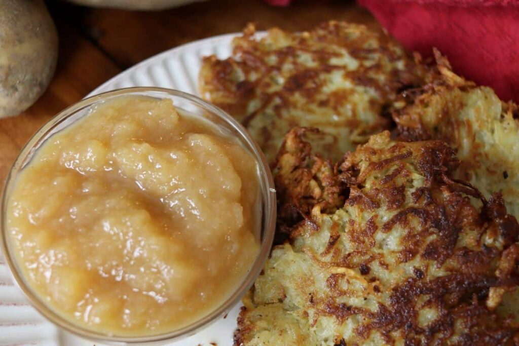 authentic german potato pancakes served with a side of applesauce
