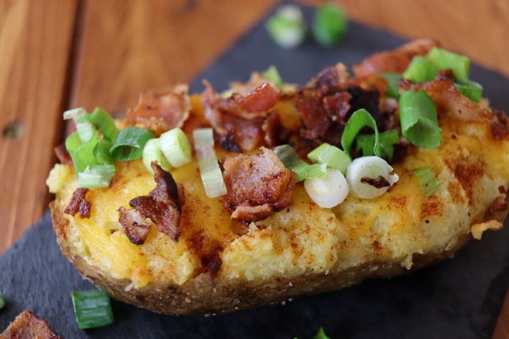 stuffed potato with scallion and bacon topping