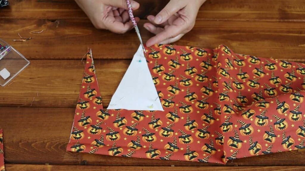 cutting material to make a halloween bunting