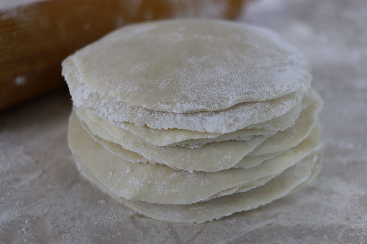 Stack of small rounds made with dough.