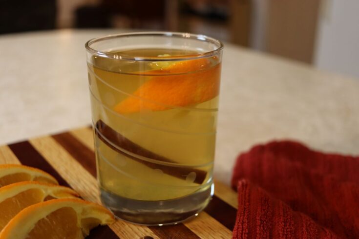 freshly made brandy hot toddy in a glass on a counter