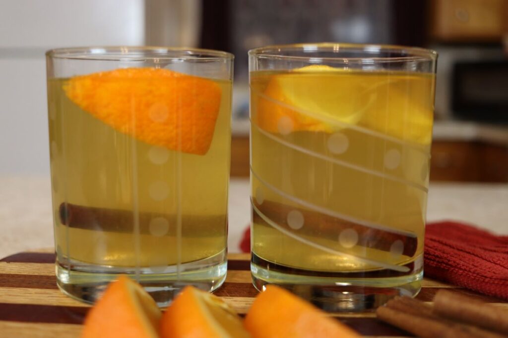 brandy hot toddy drinks with orange slices