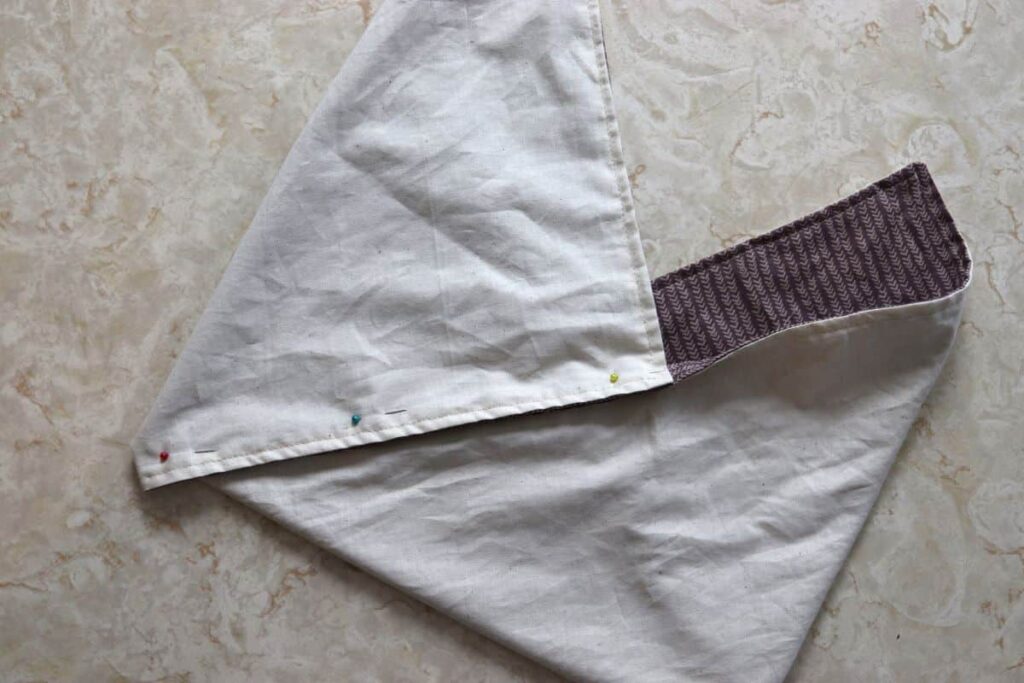 seam pinned to be sewn on a reversible bento bread bag