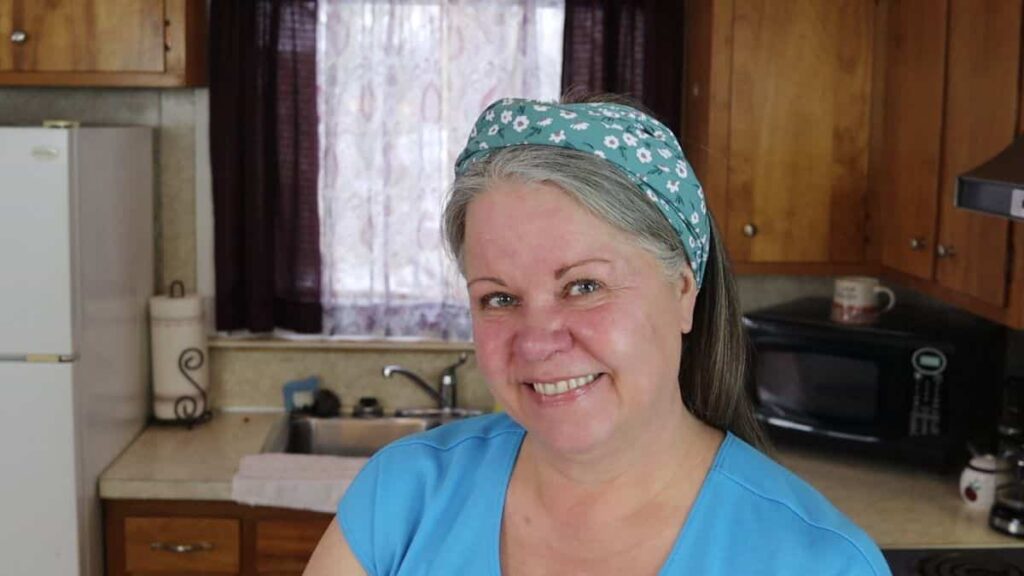 woman wearing a home sewn head scarf