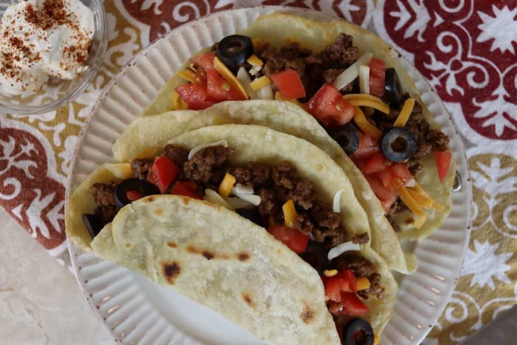 freshly made tacos on a dish