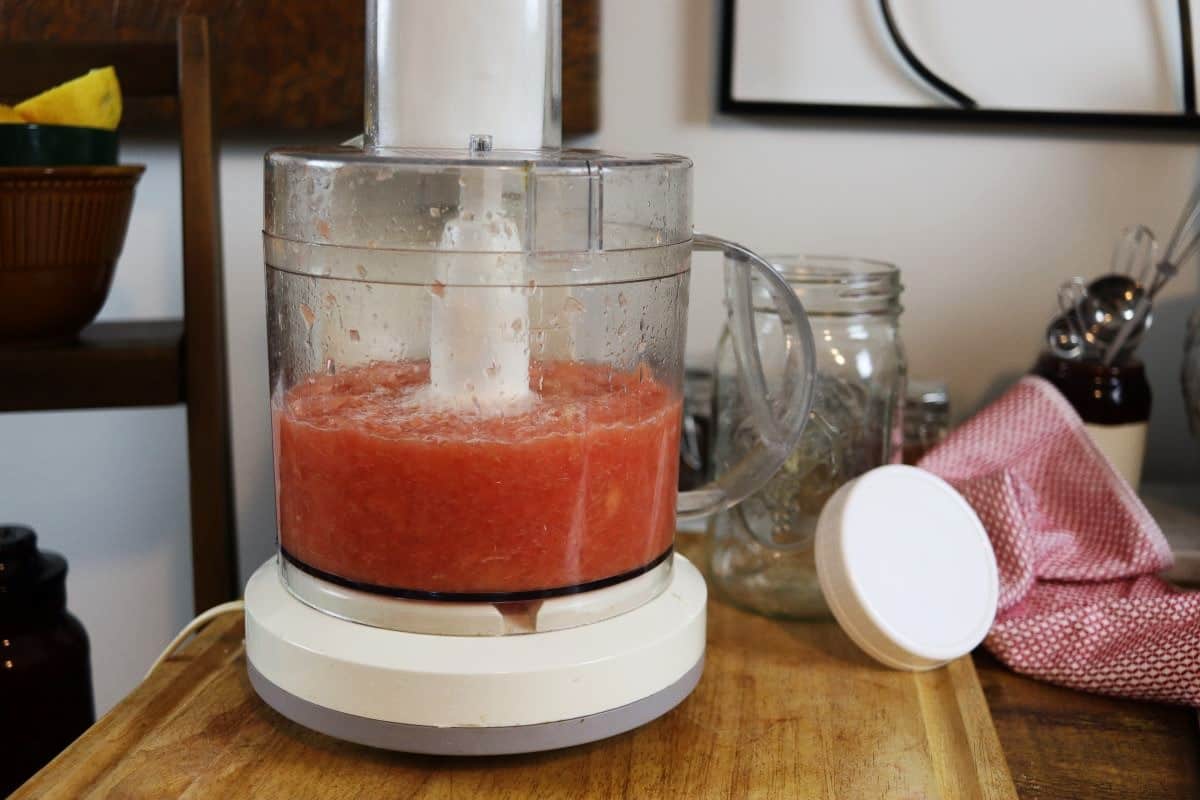 pureed grapefruit in a food processor.