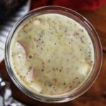 overview of a jar of stone ground mustard sauce.