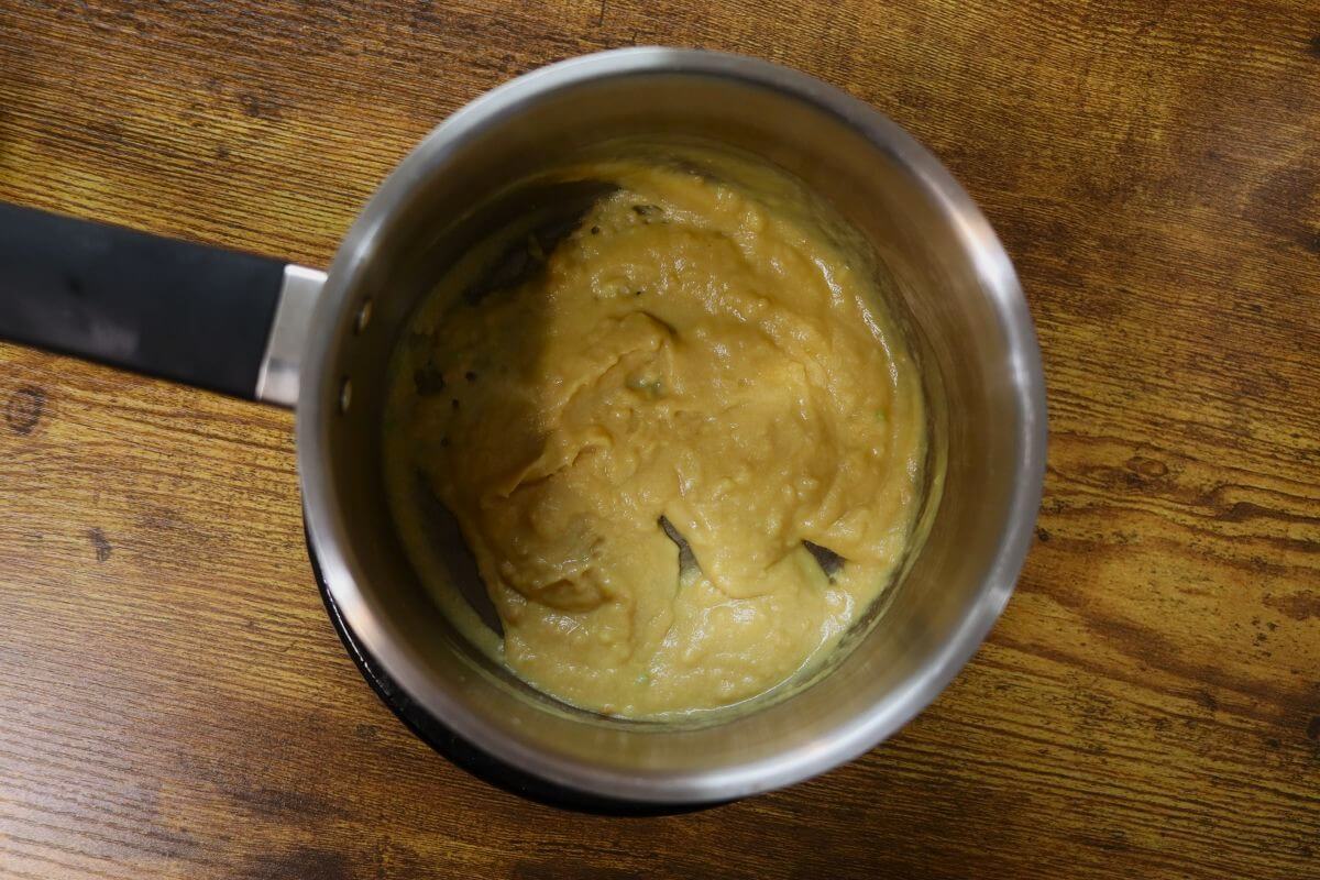 Thick mustard in a small saucepan.