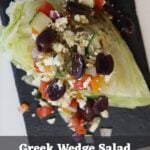 Iceberg wedge with diced vegetables, feta, olives, and overlay text “Greek Wedge Salad Stop Making Boring Salads".