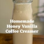 Glass bottle of homemade honey vanilla coffee creamer with text reading "Homemade Honey Vanilla Coffee Creamer".