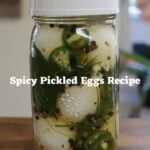 Mason jar of pickled eggs with jalapeño slices and text "Spicy Pickled Eggs Recipe".