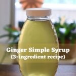 Homemade ginger simple syrup in a glass bottle with a white lid. Overlay text reads "Ginger Simple Syrup (3-ingredient recipe)".