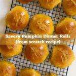 Savory pumpkin dinner rolls cooling on a wire rack with the text "Savory Pumpkin Dinner Rolls (from scratch recipe)".