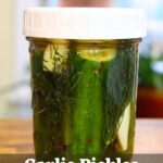 Whole garlic pickles packed with fresh dill and “Garlic Pickles (Quick Pickle Recipe)” text.