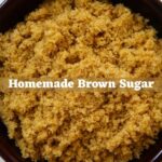 Homemade brown sugar in a dark brown bowl with a Homemade Brown Sugar text overlay.