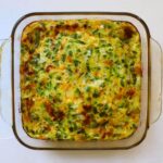 Western egg casserole with green peppers, onions, and browned melted cheese fresh from the oven.