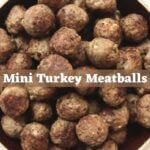 Mini turkey meatballs piled in a bowl with a text overlay reading “Mini Turkey Meatballs".